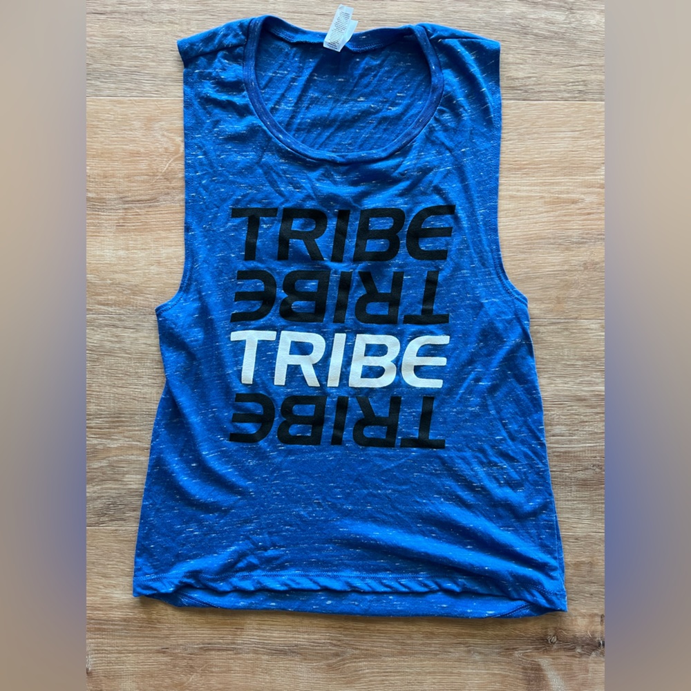 Bella canvas tank. Blue, says TRIBE. Size small.